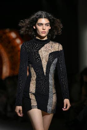 Custo - Mercedes-Benz Fashion Week Madrid - 20 Mar 2026 A model walks the runway wearing a design by Custo during the Mercedes-Benz Fashion Week de Madrid in IFEMA. Madrid Spain Copyright: xAtilanoxGarciax xSOPAxImagesx photos09785