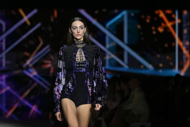 Custo - Mercedes-Benz Fashion Week Madrid - 20 Mar 2026 A model walks the runway wearing a design by Custo during the Mercedes-Benz Fashion Week de Madrid in IFEMA. Madrid Spain Copyright: xAtilanoxGarciax xSOPAxImagesx photos09793