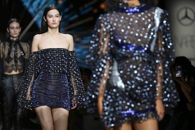 Custo - Mercedes-Benz Fashion Week Madrid - 20 Mar 2026 A model walks the runway wearing a design by Custo during the Mercedes-Benz Fashion Week de Madrid in IFEMA. Madrid Spain Copyright: xAtilanoxGarciax xSOPAxImagesx photos09795