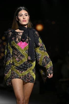 Custo - Mercedes-Benz Fashion Week Madrid - 20 Mar 2026 A model walks the runway wearing a design by Custo during the Mercedes-Benz Fashion Week de Madrid in IFEMA. Madrid Spain Copyright: xAtilanoxGarciax xSOPAxImagesx photos09759