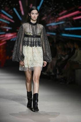 Custo - Mercedes-Benz Fashion Week Madrid - 20 Mar 2026 A model walks the runway wearing a design by Custo during the Mercedes-Benz Fashion Week de Madrid in IFEMA. Madrid Spain Copyright: xAtilanoxGarciax xSOPAxImagesx photos09760