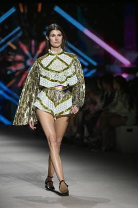 Custo - Mercedes-Benz Fashion Week Madrid - 20 Mar 2026 A model walks the runway wearing a design by Custo during the Mercedes-Benz Fashion Week de Madrid in IFEMA. Madrid Spain Copyright: xAtilanoxGarciax xSOPAxImagesx photos09765