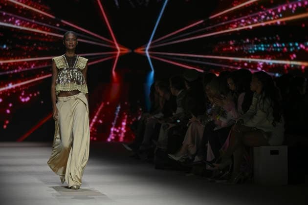 Custo - Mercedes-Benz Fashion Week Madrid - 20 Mar 2026 A model walks the runway wearing a design by Custo during the Mercedes-Benz Fashion Week de Madrid in IFEMA. Madrid Spain Copyright: xAtilanoxGarciax xSOPAxImagesx photos09767