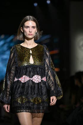 Custo - Mercedes-Benz Fashion Week Madrid - 20 Mar 2026 A model walks the runway wearing a design by Custo during the Mercedes-Benz Fashion Week de Madrid in IFEMA. Madrid Spain Copyright: xAtilanoxGarciax xSOPAxImagesx photos09772