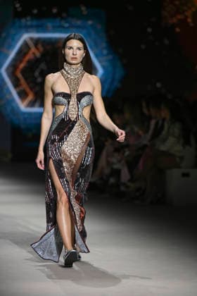 Custo - Mercedes-Benz Fashion Week Madrid - 20 Mar 2026 A model walks the runway wearing a design by Custo during the Mercedes-Benz Fashion Week de Madrid in IFEMA. Madrid Spain Copyright: xAtilanoxGarciax xSOPAxImagesx photos09774