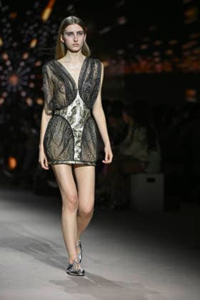 Custo - Mercedes-Benz Fashion Week Madrid - 20 Mar 2026 A model walks the runway wearing a design by Custo during the Mercedes-Benz Fashion Week de Madrid in IFEMA. Madrid Spain Copyright: xAtilanoxGarciax xSOPAxImagesx photos09777