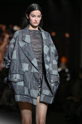 Custo - Mercedes-Benz Fashion Week Madrid - 20 Mar 2026 A model walks the runway wearing a design by Custo during the Mercedes-Benz Fashion Week de Madrid in IFEMA. Madrid Spain Copyright: xAtilanoxGarciax xSOPAxImagesx photos09729