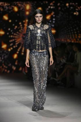 Custo - Mercedes-Benz Fashion Week Madrid - 20 Mar 2026 A model walks the runway wearing a design by Custo during the Mercedes-Benz Fashion Week de Madrid in IFEMA. Madrid Spain Copyright: xAtilanoxGarciax xSOPAxImagesx photos09730