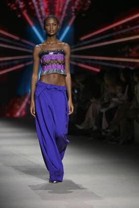 Custo - Mercedes-Benz Fashion Week Madrid - 20 Mar 2026 A model walks the runway wearing a design by Custo during the Mercedes-Benz Fashion Week de Madrid in IFEMA. Madrid Spain Copyright: xAtilanoxGarciax xSOPAxImagesx photos09743