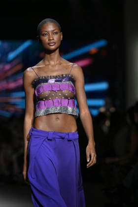 Custo - Mercedes-Benz Fashion Week Madrid - 20 Mar 2026 A model walks the runway wearing a design by Custo during the Mercedes-Benz Fashion Week de Madrid in IFEMA. Madrid Spain Copyright: xAtilanoxGarciax xSOPAxImagesx photos09744