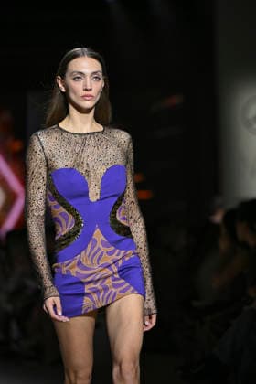 Custo - Mercedes-Benz Fashion Week Madrid - 20 Mar 2026 A model walks the runway wearing a design by Custo during the Mercedes-Benz Fashion Week de Madrid in IFEMA. Madrid Spain Copyright: xAtilanoxGarciax xSOPAxImagesx photos09748