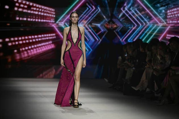 Custo - Mercedes-Benz Fashion Week Madrid - 20 Mar 2026 A model walks the runway wearing a design by Custo during the Mercedes-Benz Fashion Week de Madrid in IFEMA. Madrid Spain Copyright: xAtilanoxGarciax xSOPAxImagesx photos09711