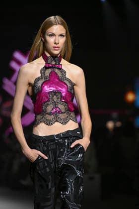 Custo - Mercedes-Benz Fashion Week Madrid - 20 Mar 2026 A model walks the runway wearing a design by Custo during the Mercedes-Benz Fashion Week de Madrid in IFEMA. Madrid Spain Copyright: xAtilanoxGarciax xSOPAxImagesx photos09713