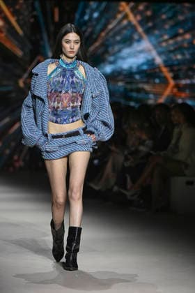 Custo - Mercedes-Benz Fashion Week Madrid - 20 Mar 2026 A model walks the runway wearing a design by Custo during the Mercedes-Benz Fashion Week de Madrid in IFEMA. Madrid Spain Copyright: xAtilanoxGarciax xSOPAxImagesx photos09718