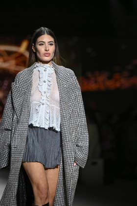 Custo - Mercedes-Benz Fashion Week Madrid - 20 Mar 2026 A model walks the runway wearing a design by Custo during the Mercedes-Benz Fashion Week de Madrid in IFEMA. Madrid Spain Copyright: xAtilanoxGarciax xSOPAxImagesx photos09723