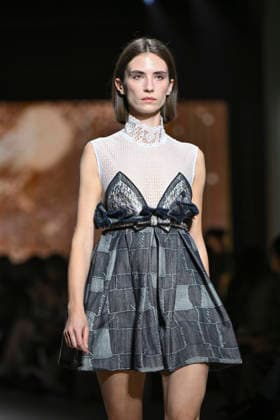 Custo - Mercedes-Benz Fashion Week Madrid - 20 Mar 2026 A model walks the runway wearing a design by Custo during the Mercedes-Benz Fashion Week de Madrid in IFEMA. Madrid Spain Copyright: xAtilanoxGarciax xSOPAxImagesx photos09727