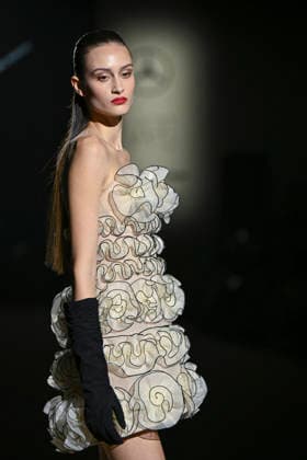 Hannibal Laguna - Mercedes-Benz Fashion Week Madrid in Madrid, Spain - 20 Mar 2026 A model walks the runway wearing a design by Hannibal Laguna during Mercedes-Benz Fashion Week de Madrid in IFEMA. Madrid Spain Copyright: xAtilanoxGarciax xSOPAxImagesx photos09684