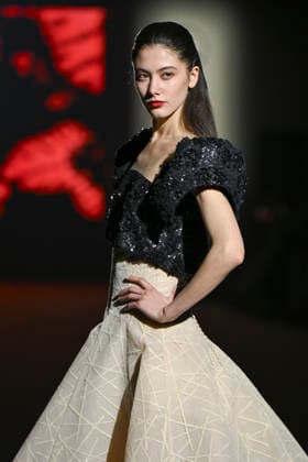 Hannibal Laguna - Mercedes-Benz Fashion Week Madrid in Madrid, Spain - 20 Mar 2026 A model walks the runway wearing a design by Hannibal Laguna during Mercedes-Benz Fashion Week de Madrid in IFEMA. Madrid Spain Copyright: xAtilanoxGarciax xSOPAxImagesx photos09659