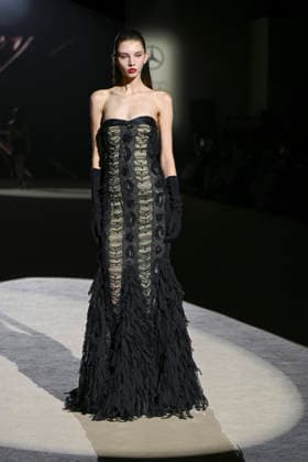 Hannibal Laguna - Mercedes-Benz Fashion Week Madrid in Madrid, Spain - 20 Mar 2026 A model walks the runway wearing a design by Hannibal Laguna during Mercedes-Benz Fashion Week de Madrid in IFEMA. Madrid Spain Copyright: xAtilanoxGarciax xSOPAxImagesx photos09621