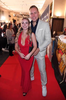 Patrick Romer with girlfriend Annelie Henze at the ERIC SINDERMANN IKONE FASHION SHOW at the Hofbräu Wirtshaus in Berlin on 20 03 2026