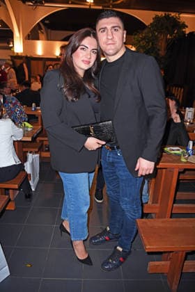 Marco Huck with his wife Amina Huck at the ERIC SINDERMANN IKONE FASHION SHOW at the Hofbräu Wirtshaus in Berlin on 20 03 2026