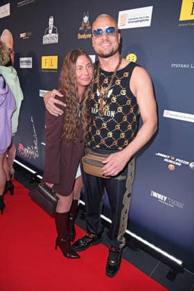 Eric Sindermann with girlfriend Chayenne at the ERIC SINDERMANN IKONE FASHION SHOW at the Hofbräu Wirtshaus in Berlin on 20 03 2026