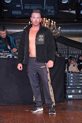 Lukas Reiter friend of Ginger Costello Wollersheim at the ERIC SINDERMANN IKONE FASHION SHOW at Hofbräu Wirtshaus in Berlin on 20 03 2026