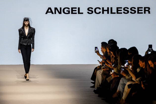 Angel Schlessers fashion show at Mercedes Benz Fashion Week A model during an Angel Schlessers fashion show on the occasion of the Mercedes Benz Fashion Week, March 21, 2026, in Madrid Spain Angel Schlessers fashion show is part of the Mercedes Benz Fashion Week Madrid, the main Spanish fashion show organized by IFEMA, which brings together established firms and new talents The brand, historical hallmark of Spanish fashion, stands out for its minimalism and refined tailoring MARCH 21, 2026 FASHION Madrid Madrid Madrid Spain  Copyright: xRicardoxRubiox 7384492