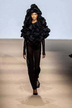 Angel Schlessers fashion show at Mercedes Benz Fashion Week A model during an Angel Schlessers fashion show on the occasion of the Mercedes Benz Fashion Week, March 21, 2026, in Madrid Spain Angel Schlessers fashion show is part of the Mercedes Benz Fashion Week Madrid, the main Spanish fashion show organized by IFEMA, which brings together established firms and new talents The brand, historical hallmark of Spanish fashion, stands out for its minimalism and refined tailoring MARCH 21, 2026 FASHION Madrid Madrid Madrid Spain  Copyright: xRicardoxRubiox 7384505