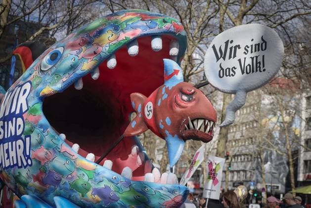 News Bilder des Tages International Day for Elimination of Racial Discrimination march in Cologne COLOGNE, GERMANY - MARCH 21: People, holding banners, gathered at the Suderman Square march during the International Day for the Elimination of Racial Discrimination in Cologne, Germany on March 21, 2026. Thousands of people participated in an anti-racism and far-right march and rally organized by the Cologne Rises Up initiative on the occasion of March 21 International Day for the Elimination of Racial Discrimination . During the march, which lasted approximately four hours in the city center, protesters chanted anti-racist slogans. Kadir Ilboga Anadolu Cologne Germany. Editorial use only. Please get in touch for any other usage.  Copyright: x2026xAnadoluxKadirxIlbogax