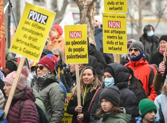 March 21, 2026, Montreal, Pq, Canada: People take part in a protest against the U.S. and Israeli war against Iran and Lebanon in Montreal, Saturday, March 21, 2026. Montreal Canada  - ZUMAc35_ 20260321_zaf_c35_043 Copyright: xGrahamxHughesx