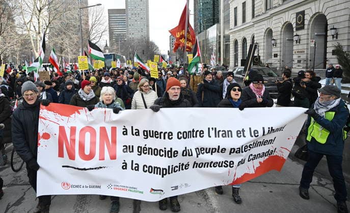 March 21, 2026, Montreal, Pq, Canada: People take part in a protest against the U.S. and Israeli war against Iran and Lebanon in Montreal, Saturday, March 21, 2026. Montreal Canada  - ZUMAc35_ 20260321_zaf_c35_061 Copyright: xGrahamxHughesx