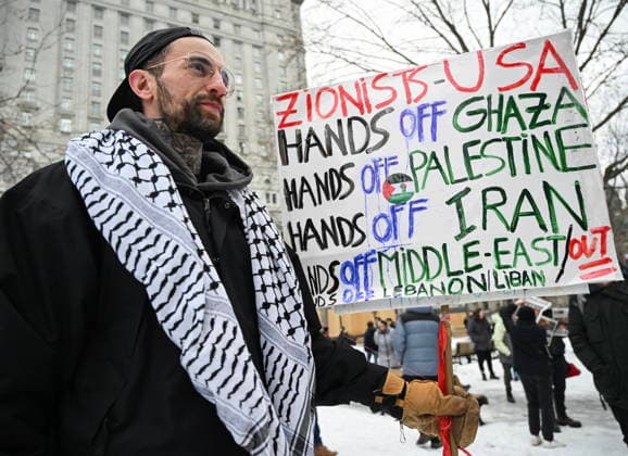 March 21, 2026, Montreal, Pq, Canada: People take part in a protest against the U.S. and Israeli war against Iran and Lebanon in Montreal, Saturday, March 21, 2026. Montreal Canada  - ZUMAc35_ 20260321_zaf_c35_075 Copyright: xGrahamxHughesx