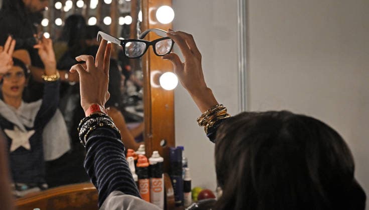 March 21, 2026, Mumbai, Maharashtra, India: A model is seen using a Ray-Ban Meta glasses inside the makeup room at the Lakme Fashion Week (LFW) in Mumbai. Mumbai India - ZUMAs197 20260321_aaa_s197_114 Copyright: xAshishxVaishnavx