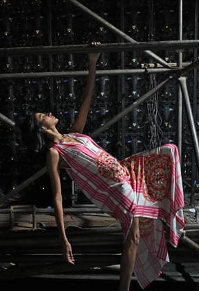 March 21, 2026, Mumbai, Maharashtra, India: A model holding a metal pole poses for a photo in-between the show at the Lakme Fashion Week (LFW) in Mumbai. Mumbai India - ZUMAs197 20260321_aaa_s197_119 Copyright: xAshishxVaishnavx