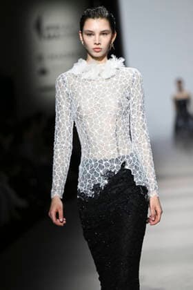 Yolancris - Mercedes-Benz Fashion Week Madrid, Spain - 21 Mar 2026 A model walks the runway wearing a design by Yolancris during Mercedes-Benz Fashion Week de Madrid in IFEMA. Madrid Spain Copyright: xAtilanoxGarciax xSOPAxImagesx photos10055
