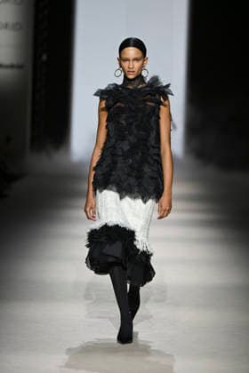 Yolancris - Mercedes-Benz Fashion Week Madrid, Spain - 21 Mar 2026 A model walks the runway wearing a design by Yolancris during Mercedes-Benz Fashion Week de Madrid in IFEMA. Madrid Spain Copyright: xAtilanoxGarciax xSOPAxImagesx photos10005