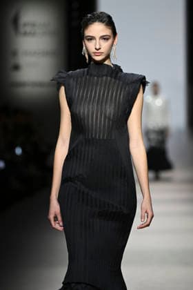 Yolancris - Mercedes-Benz Fashion Week Madrid, Spain - 21 Mar 2026 A model walks the runway wearing a design by Yolancris during Mercedes-Benz Fashion Week de Madrid in IFEMA. Madrid Spain Copyright: xAtilanoxGarciax xSOPAxImagesx photos10008