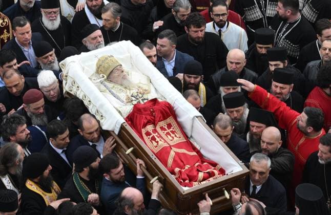 News Bilder des Tages Georgia Religion Patriarch Death 9128641 22.03.2026 People attend a funeral procession accompanying the coffin of Catholicos-Patriarch of Georgia Ilia II from the Holy Trinity Cathedral to Sioni Cathedral, where he will be buried, in Tbilisi, Georgia. Ilia II passed away at a Tbilisi clinic on March 17 at the age of 93. A five-day national period of mourning has been declared in Georgia. Kirill Zykov Sputnik Tbilisi Georgia  Copyright: xKirillxZykovx