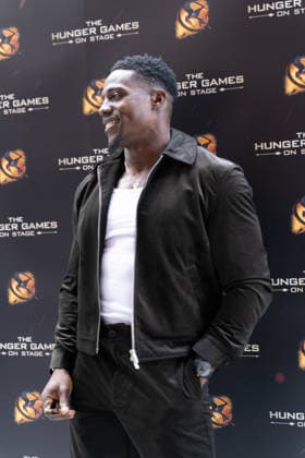 London, red carpet arrivals for the world premiere of The Hunger Games: On Stage at the Troubadour Canary Wharf Theatre. Pictured: Harry Aikines-Aryeetey  Copyright: xcristinaxmasseix xipa-agency.netx xx IPA_Agency_IPA73315931