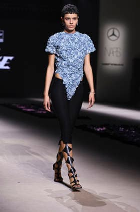 Mercedes-Benz Fashion Week Madrid in Spain - 22 Mar 2026 A model walks the runway wearing a design by Pat Equilux during Mercedes-Benz Fashion Week de Madrid in IFEMA. Madrid Spain Copyright: xAtilanoxGarciax xSOPAxImagesx photos10292