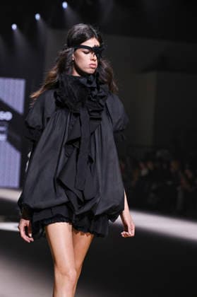 Mercedes-Benz Fashion Week Madrid in Spain - 22 Mar 2026 A model walks the runway wearing a design by Mericusan during Mercedes-Benz Fashion Week de Madrid in IFEMA. Madrid Spain Copyright: xAtilanoxGarciax xSOPAxImagesx photos10261