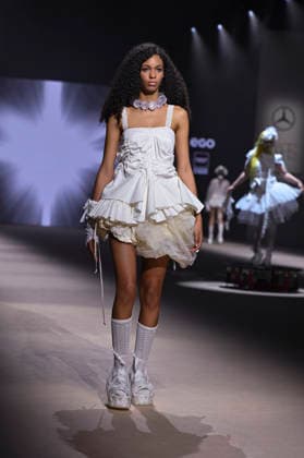 Mercedes-Benz Fashion Week Madrid in Spain - 22 Mar 2026 A model walks the runway wearing a design by Mericusan during Mercedes-Benz Fashion Week de Madrid in IFEMA. Madrid Spain Copyright: xAtilanoxGarciax xSOPAxImagesx photos10250