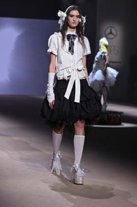 Mercedes-Benz Fashion Week Madrid in Spain - 22 Mar 2026 A model walks the runway wearing a design by Mericusan during Mercedes-Benz Fashion Week de Madrid in IFEMA. Madrid Spain Copyright: xAtilanoxGarciax xSOPAxImagesx photos10253
