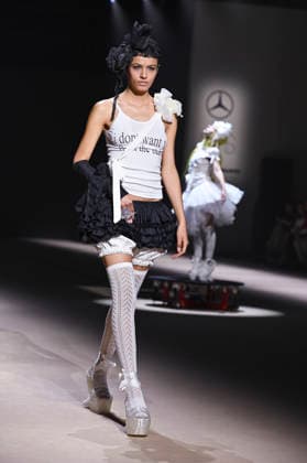 Mercedes-Benz Fashion Week Madrid in Spain - 22 Mar 2026 A model walks the runway wearing a design by Mericusan during Mercedes-Benz Fashion Week de Madrid in IFEMA. Madrid Spain Copyright: xAtilanoxGarciax xSOPAxImagesx photos10262