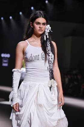 Mercedes-Benz Fashion Week Madrid in Spain - 22 Mar 2026 A model walks the runway wearing a design by Mericusan during Mercedes-Benz Fashion Week de Madrid in IFEMA. Madrid Spain Copyright: xAtilanoxGarciax xSOPAxImagesx photos10266