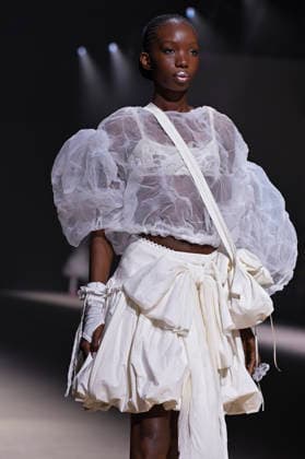 Mercedes-Benz Fashion Week Madrid in Spain - 22 Mar 2026 A model walks the runway wearing a design by Mericusan during Mercedes-Benz Fashion Week de Madrid in IFEMA. Madrid Spain Copyright: xAtilanoxGarciax xSOPAxImagesx photos10243