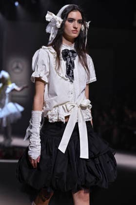 Mercedes-Benz Fashion Week Madrid in Spain - 22 Mar 2026 A model walks the runway wearing a design by Mericusan during Mercedes-Benz Fashion Week de Madrid in IFEMA. Madrid Spain Copyright: xAtilanoxGarciax xSOPAxImagesx photos10254