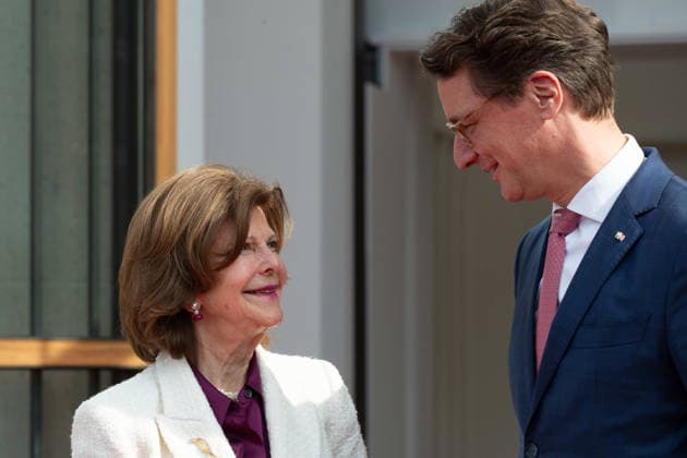 Hendrik WUEST, Wüst, CDU, State Premier of North Rhine-Westphalia, welcomes Queen SILVIA of SWEDEN, at the State Chancellery in Duesseldorf on 23 03 2026