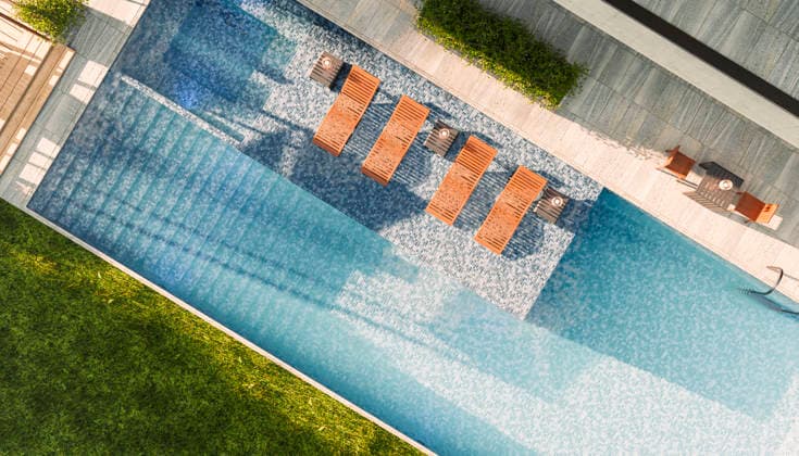Modern house with tranquil pool garden and sunbeds outdoors in summer property released, SOBF03005